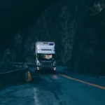 silver Scania truck driving an